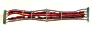 Création bracelet 5 rangs de perles de cornalines tubes rouges et grenats, fermoir et séparateurs en argent