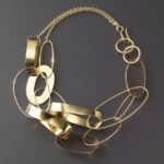 Collier anneaux multiformes en or fabriqué pour le designer Taher Chemirik
